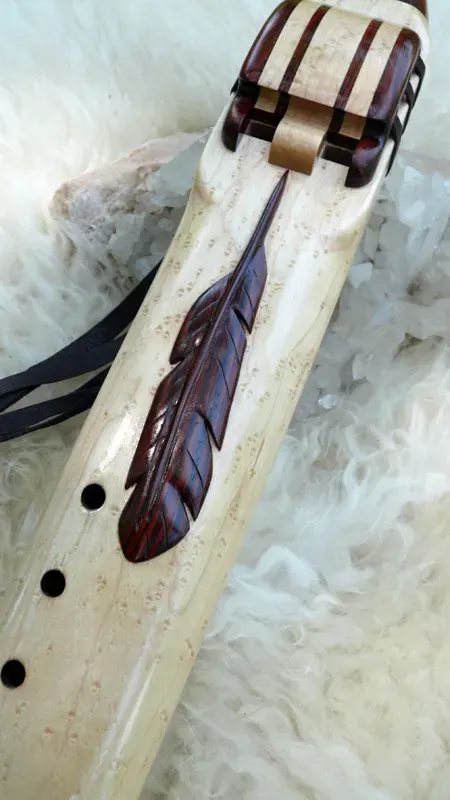 Native American Style Drone Flute 7 Hole in the Key of Low D of Bird's Eye Maple and Cocobolo woods with Feather Carving — product photo