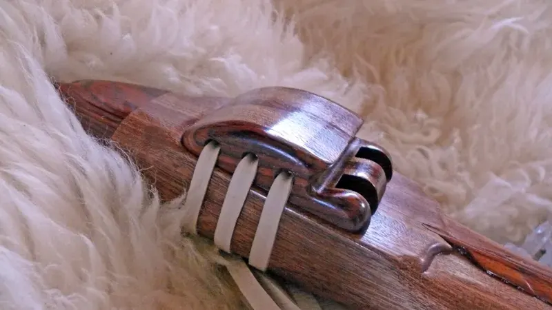Native American Style Sapele Drone Flute in the Key of E with Cocobolo accents and Carved Feather — product photo